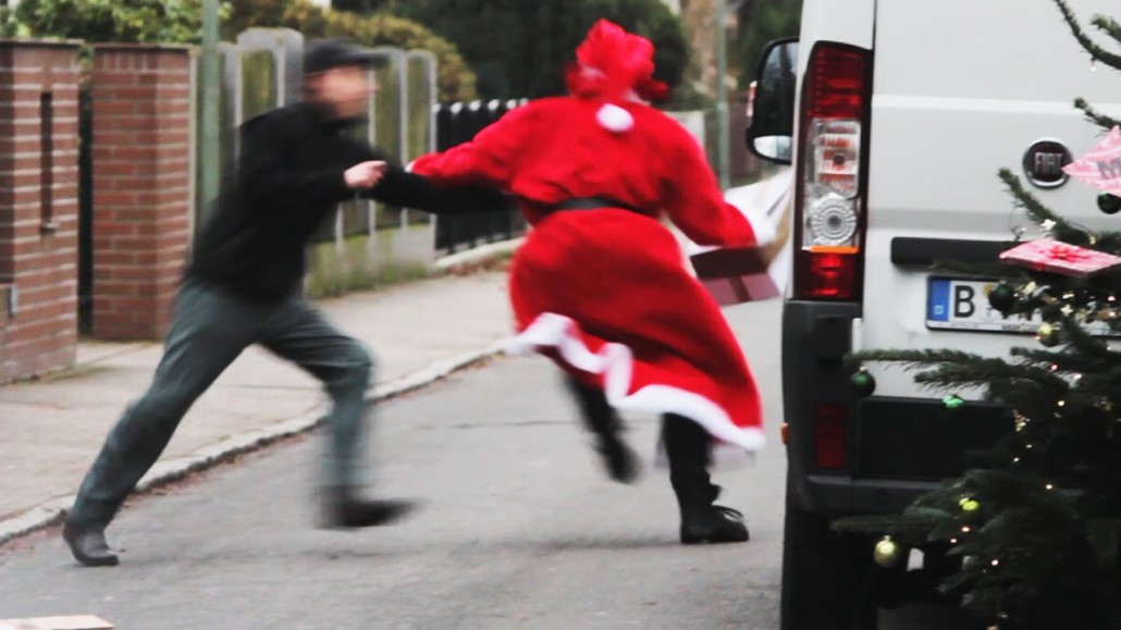 bad-santa-caught-stealing-presen